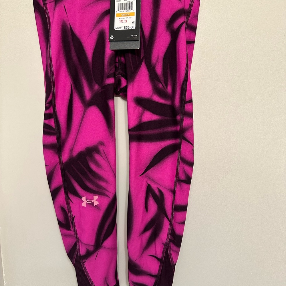 UA girls black and pink leggings.